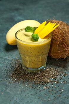 Delicious healthy mango coconut drink with chia seeds, perfect for summer refreshment.