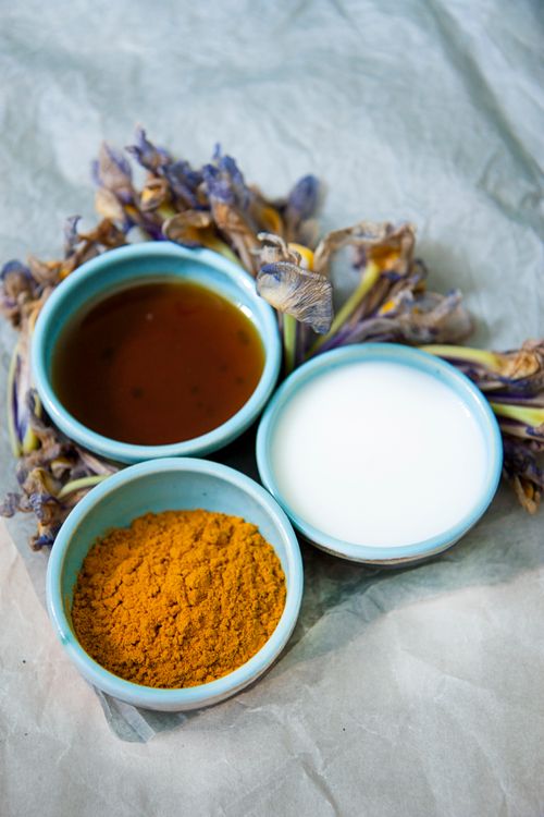 Free Three ceramic bowls with vibrant ingredients arranged on a rustic background. Stock Photo