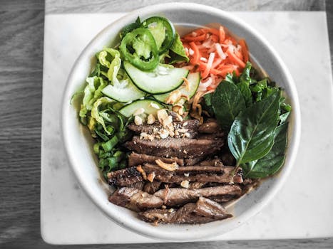 Delicious Vietnamese beef salad bowl with fresh vegetables and herbs in San Jose.