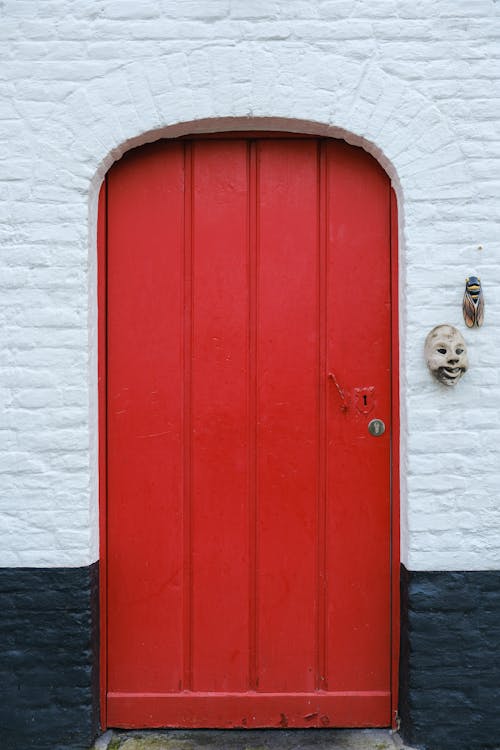 A red door with a white and black background