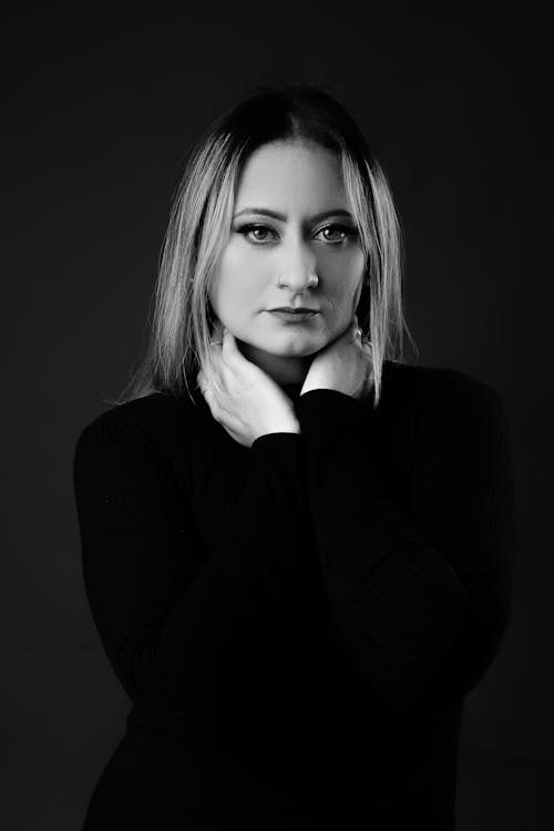 A woman in black and white posing for a portrait