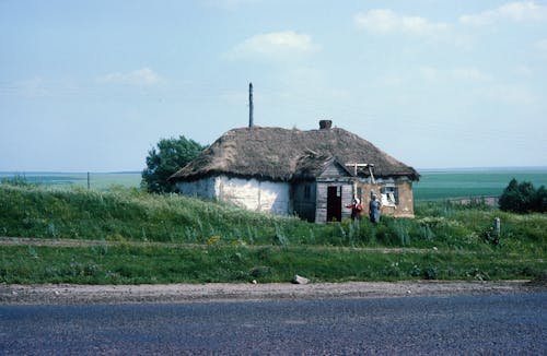 A small house on the side of the road