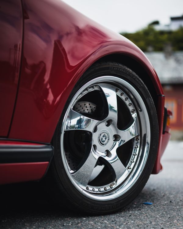 Red Rim Back View Close-Up of Classic Red Car Wheel and Rim Design · Free Stock Photo