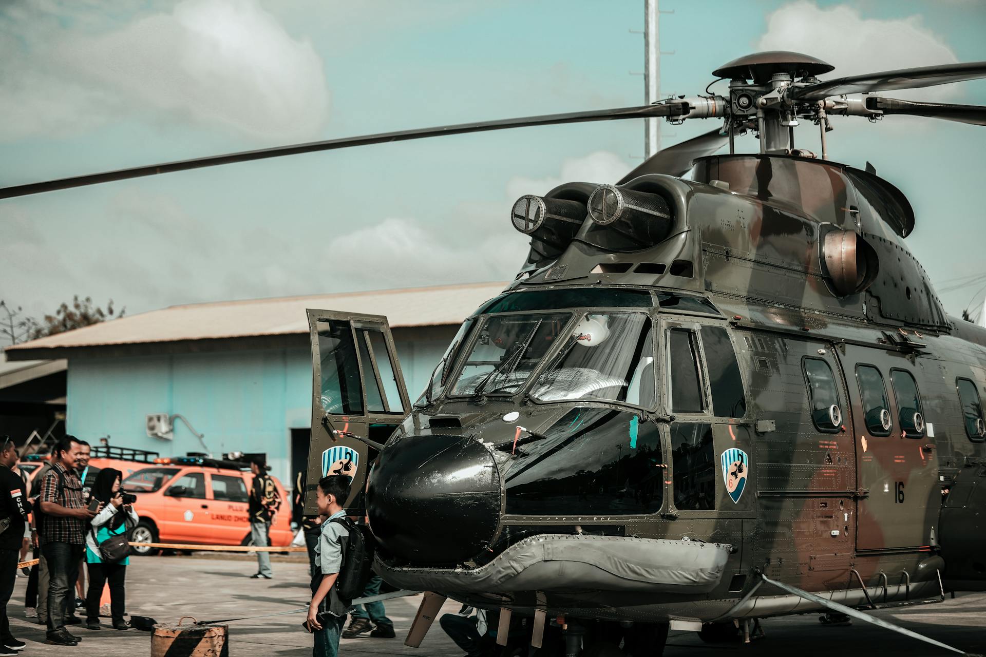 Boy Standing Near Helicopter