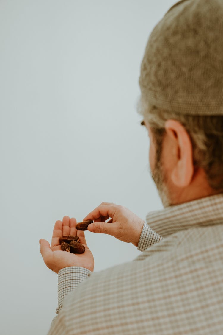 Man Holding Dates Fruit