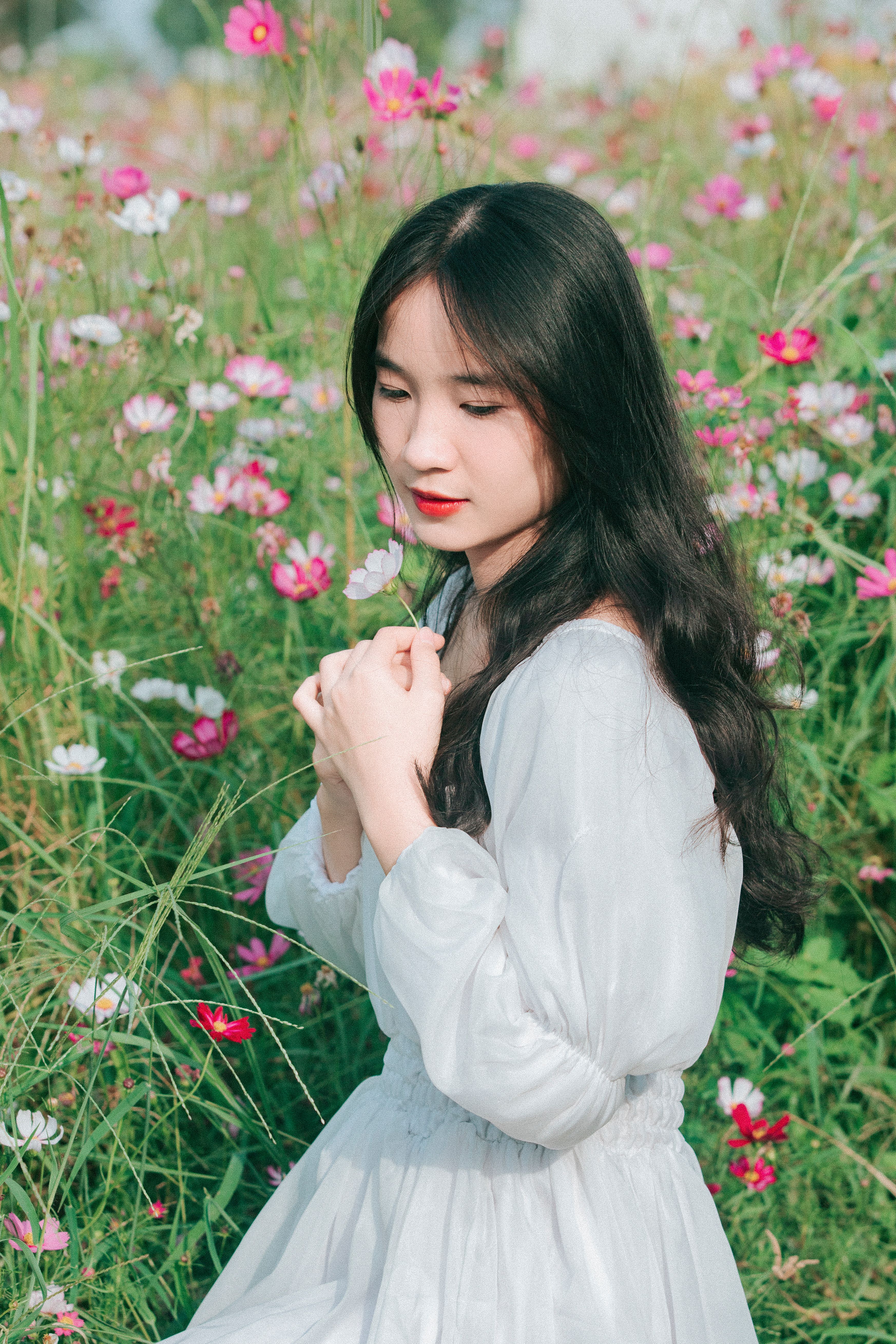 Portrait of Woman in White Dress on Meadow · Free Stock Photo