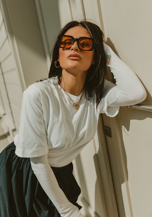 Woman Wearing Retro Sunglasses in Sunlight 