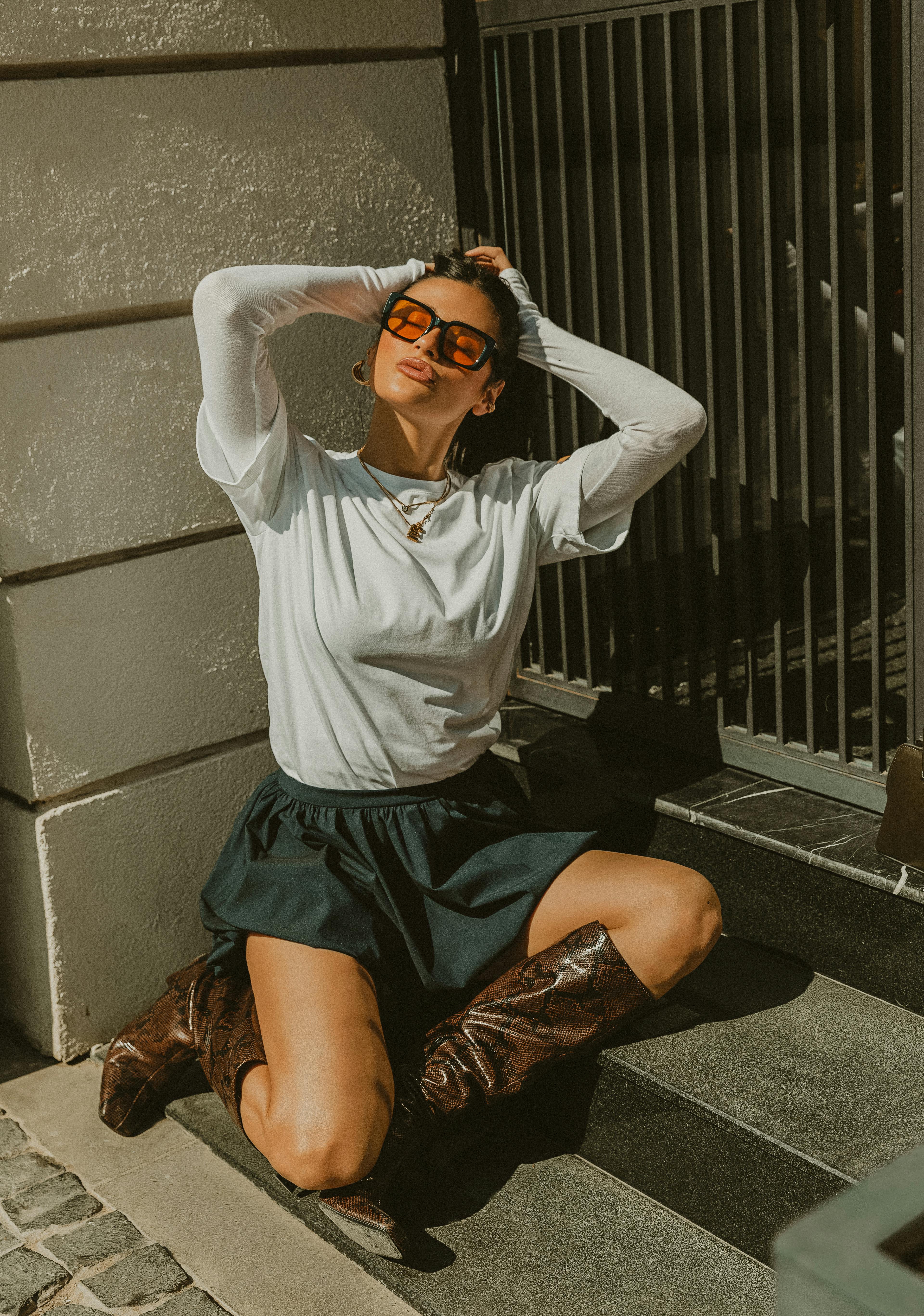 woman wearing retro sunglasses on a street