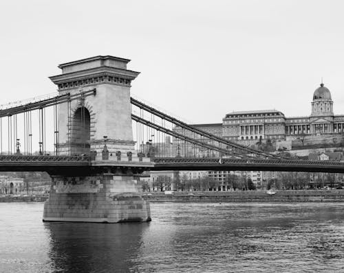 A black and white photo of the chain bridge