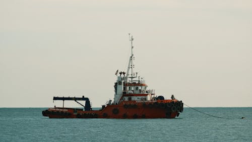 A tug boat in the water