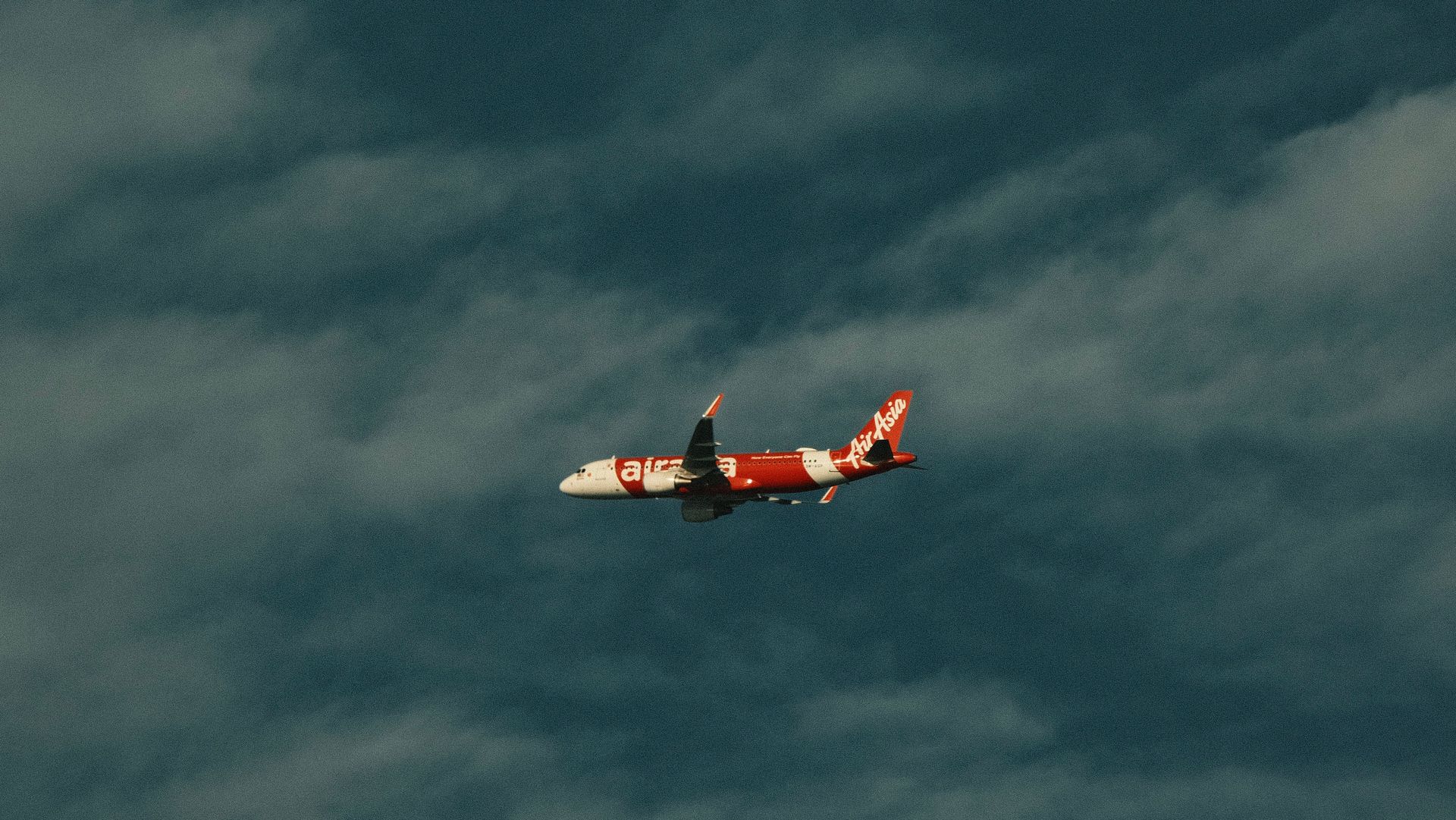 Commercial airplane in the sky, showcasing travel and aviation.