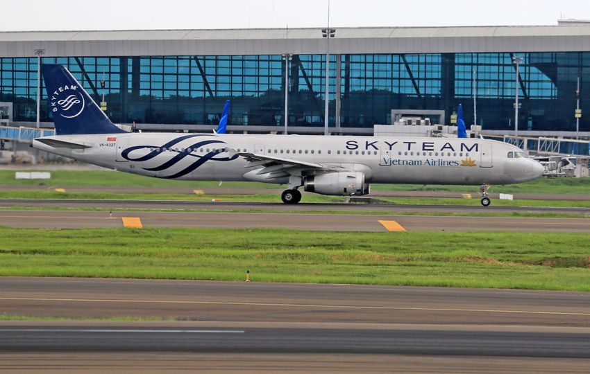 Passenger aircraft at airport — representative real photograph, not an ESPC project