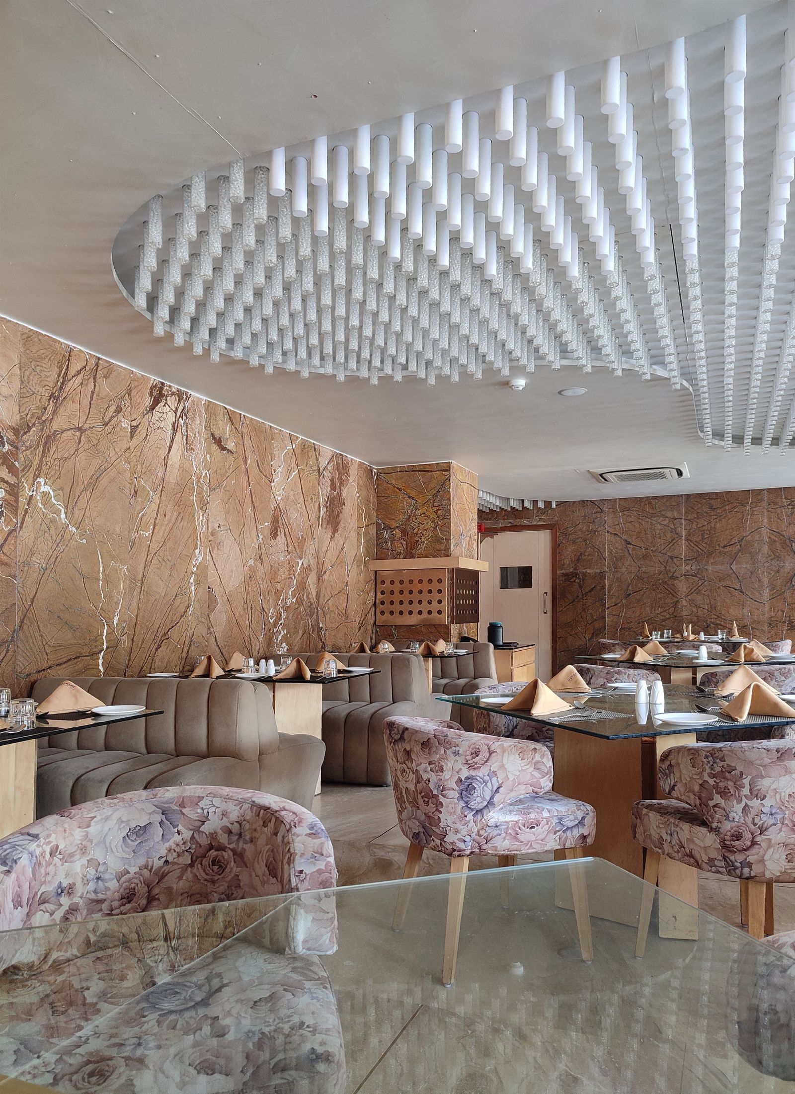 Premium commercial hospitality interior with detailed ceiling design