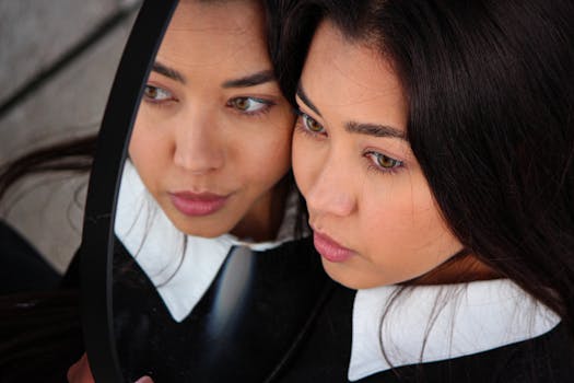 A captivating fashion portrait of a woman mirrored, taken in Berlin, Germany.
