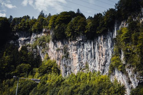 Free Majestic rock formations and lush greenery in Bürs, Vorarlberg, Austria. Stock Photo