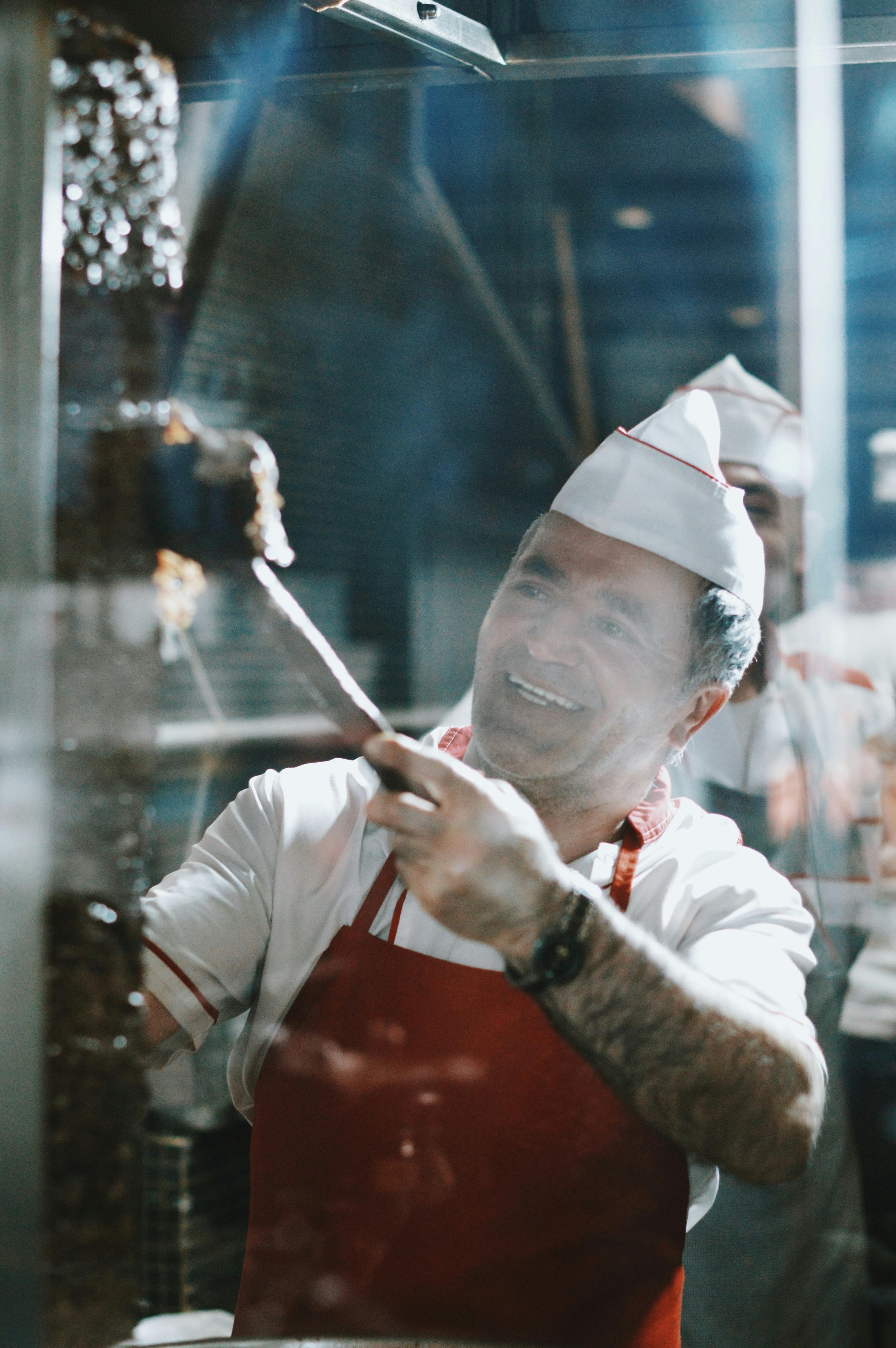 Chef demonstrating cooking techniques to an audience