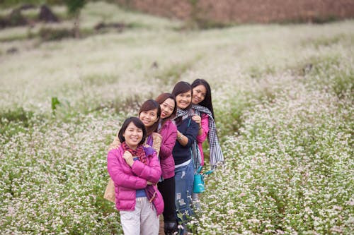 Women in a Line on a Field