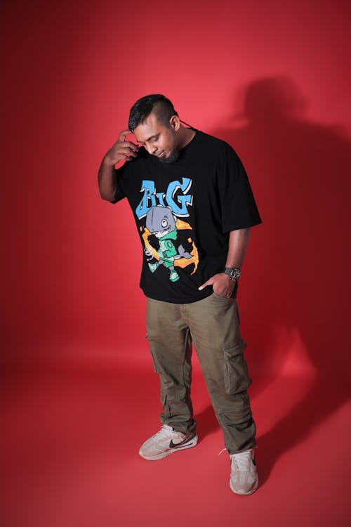 Cool Man in T-Shirt Posing in Studio