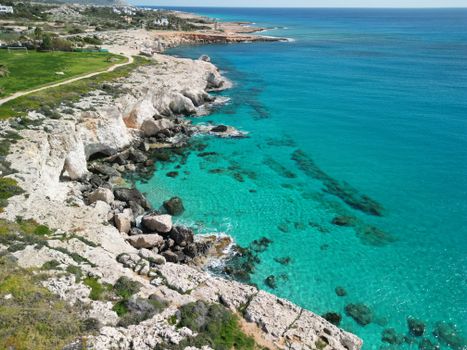 Stunning aerial photo of Ayia Napa's rocky coast with turquoise sea in Cyprus.