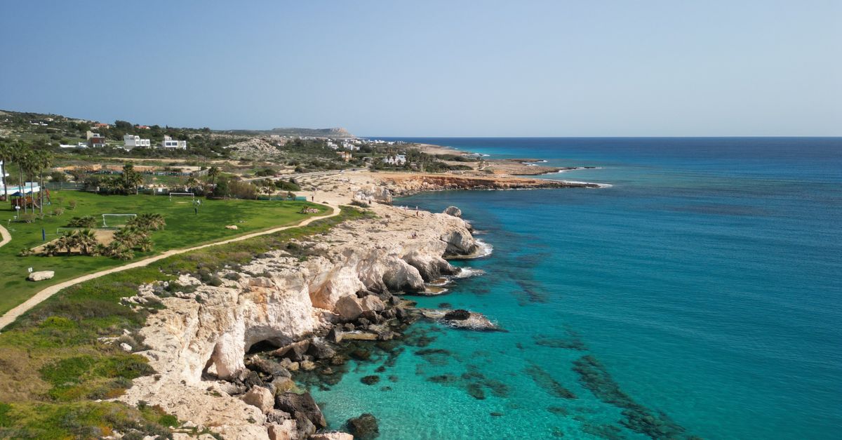 A breathtaking aerial view of Ayia Napa's rocky coastline and crystal-clear turquoise waters.