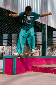 A young man skillfully skateboarding in an urban skate park with vibrant colors.