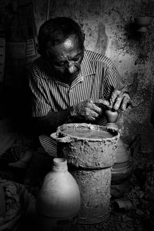 Foto profissional grátis de argila, artesão, homem