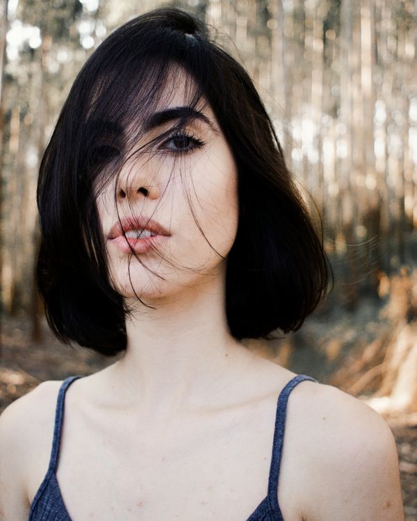 Woman with classic center-parted bob