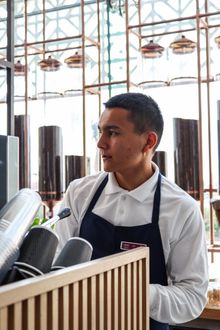 Barista in a café — photo by Fatima Said on Pexels