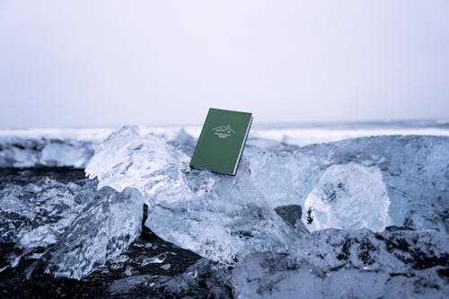 Book Lying on Block of Ice
