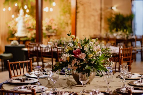 A wedding reception with tables and chairs