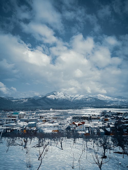 Village in a Mountain Valley Covered with Snow 