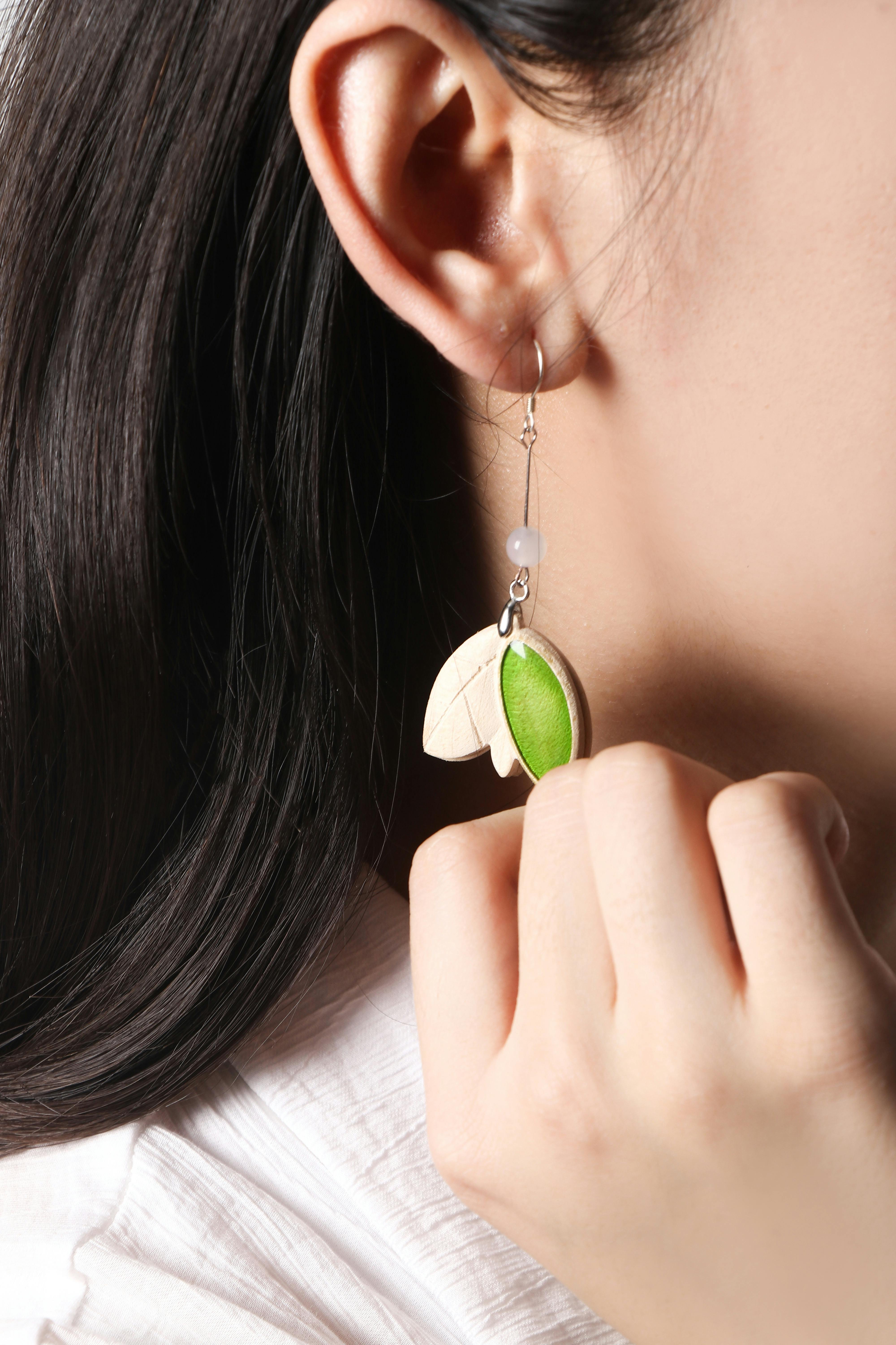 shiny and green earring