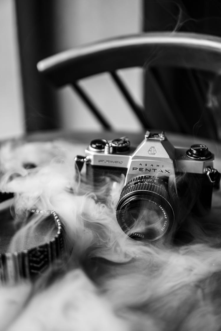 Steam And Camera On Table In Black And White