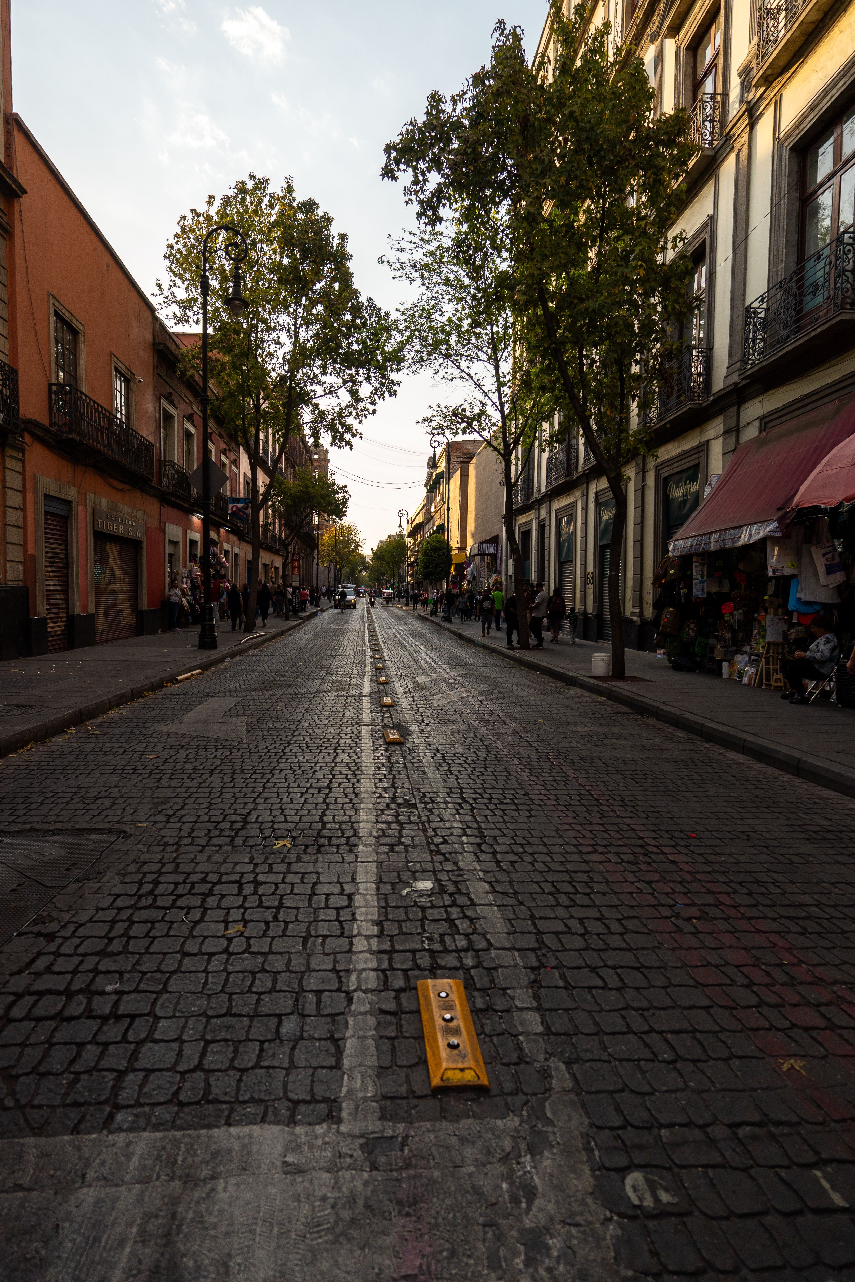 A street with a yellow line in the middle · Free Stock Photo