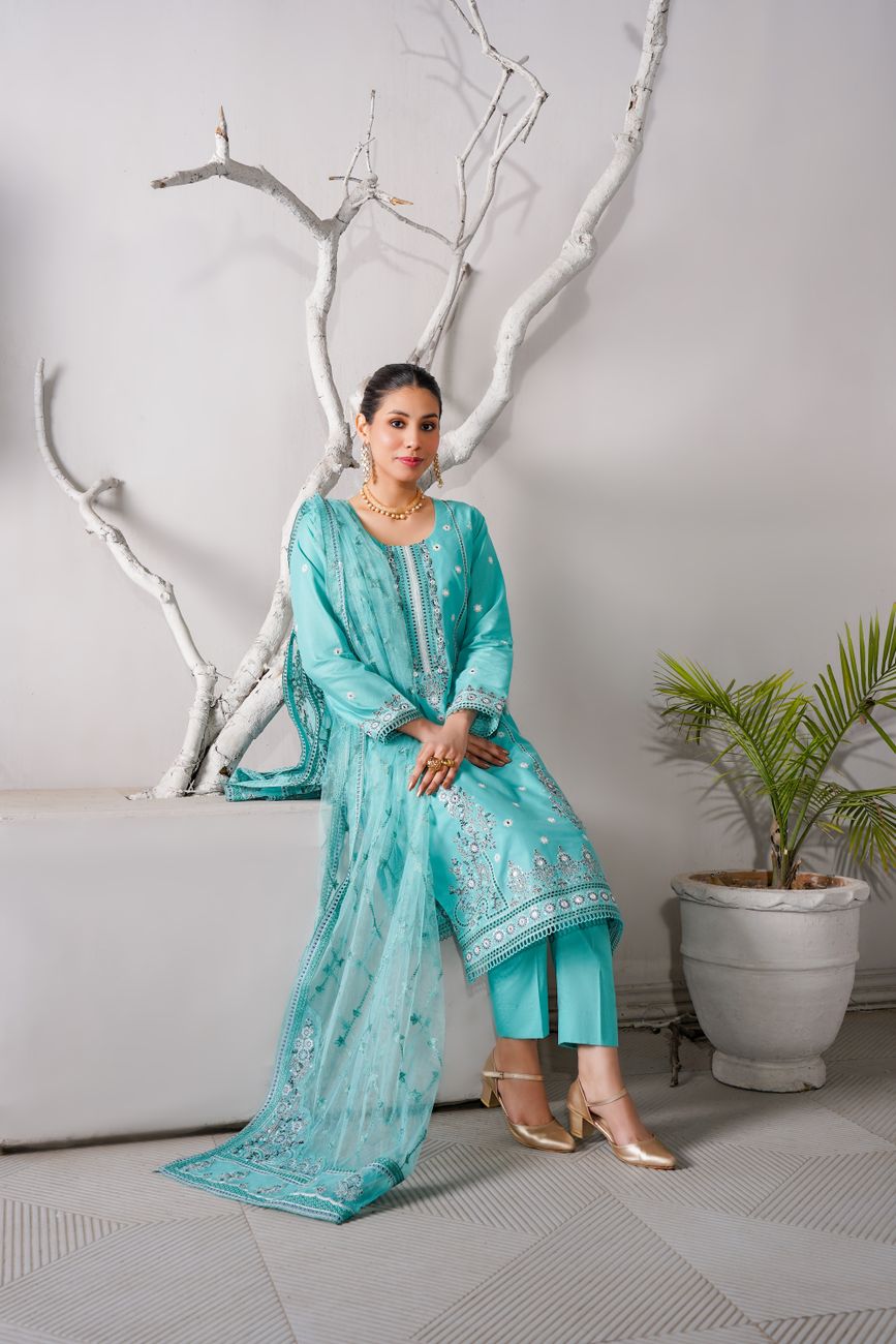 Elegant Turquoise Traditional Dress Seated