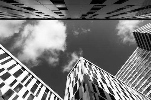 Foto profissional grátis de arquitetura contemporânea, céu nublado, cidade