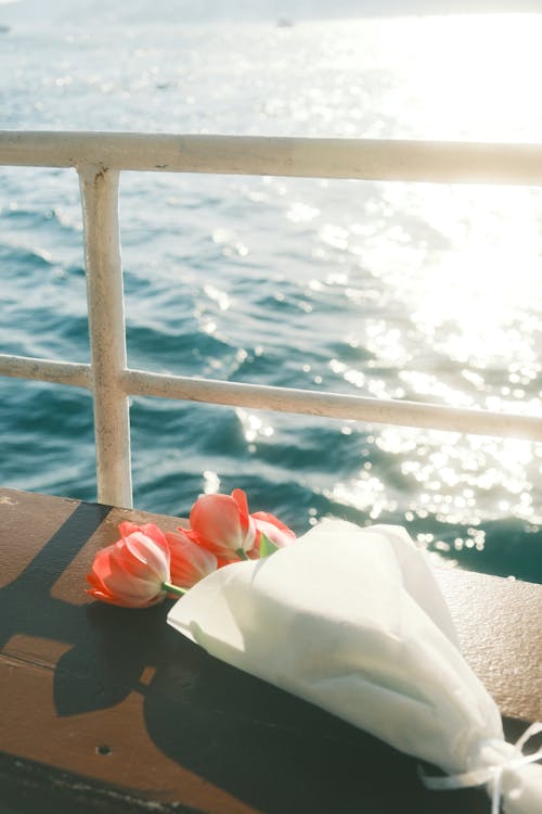 Bouquet of Tulips on a Pier in Sunlight 
