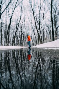 Figure by still water by Ricky Esquivel on Pexels