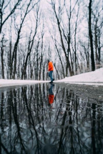Figure by still water by Ricky Esquivel on Pexels