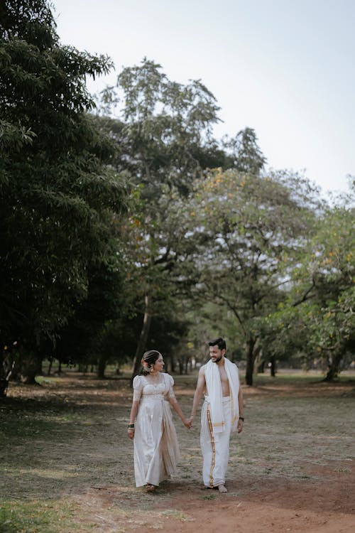 Couple in Traditional Clothing at Park