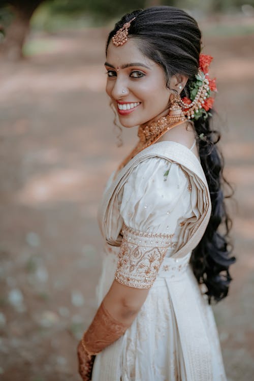 A beautiful indian bride in a white sari