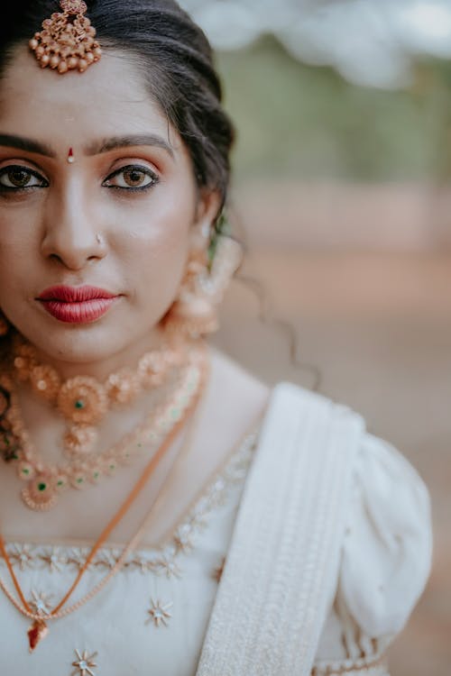 Woman with Golden Jewelry