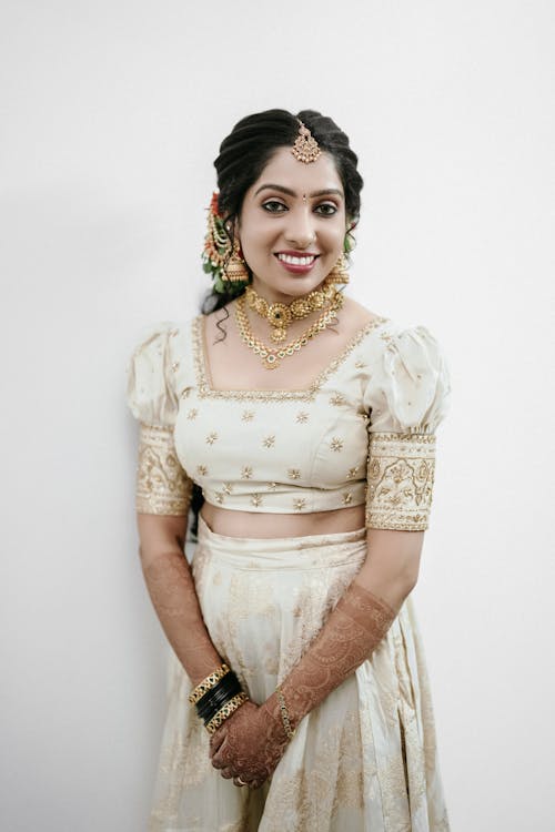 A beautiful indian bride in a white lehenga