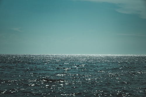 Foto profissional grátis de céu limpo, horizonte, mar