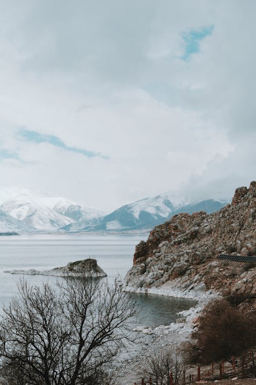 A lake and mountains in the distance