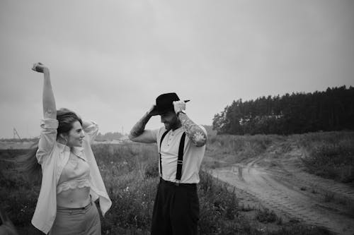 A man and woman in a field