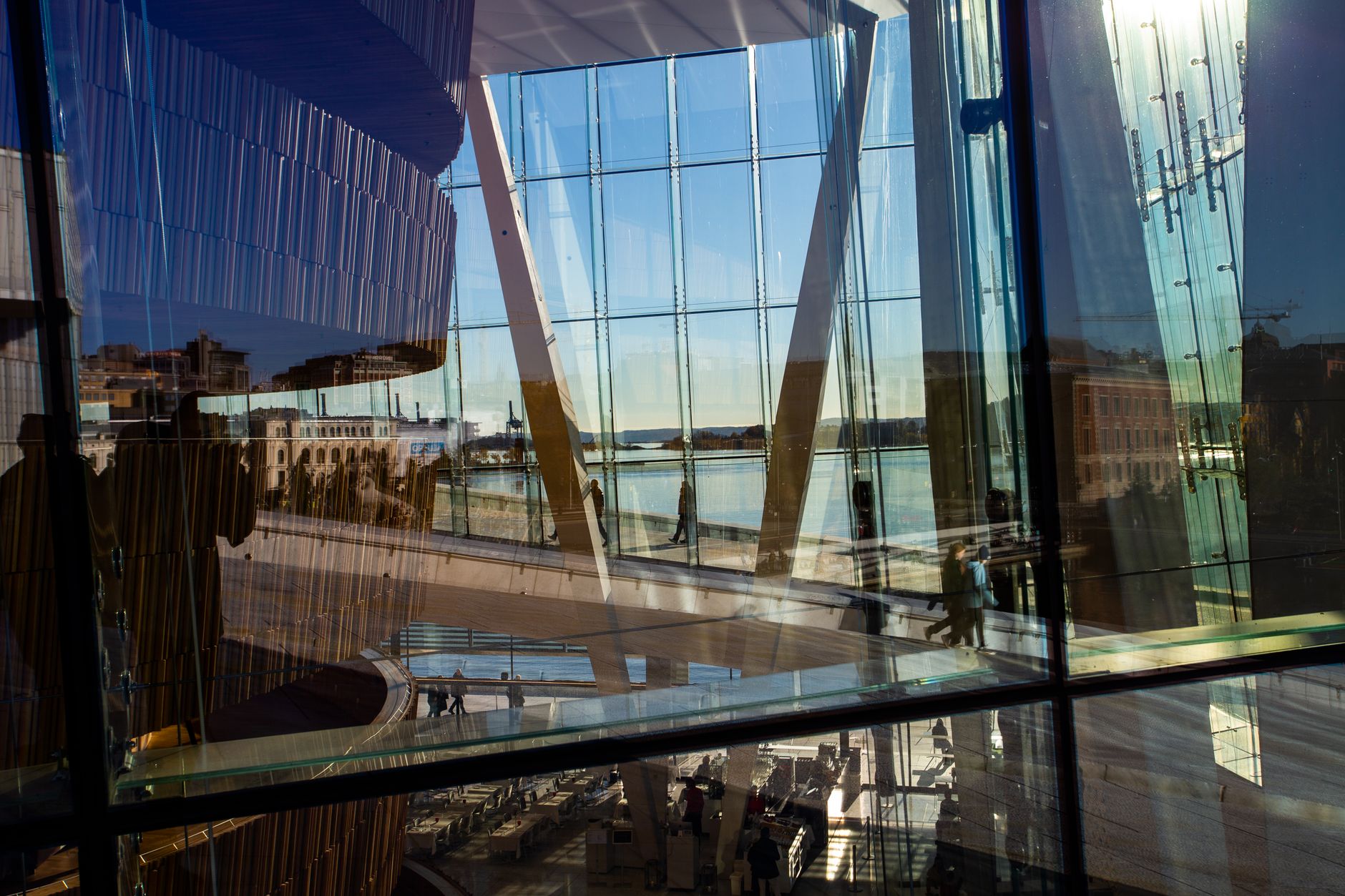 Oslo's Kennedy Library emphasizes transparency and urban connection through its extensive use of glass.