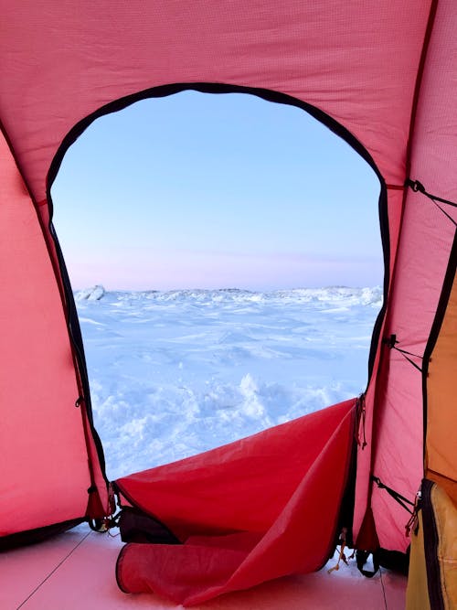 A view of a tent with a window open
