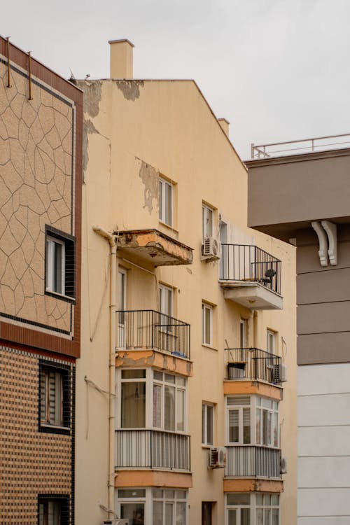 Facade of an Apartment Building with Balconies in City 