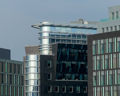 A building with a large glass window and a clock